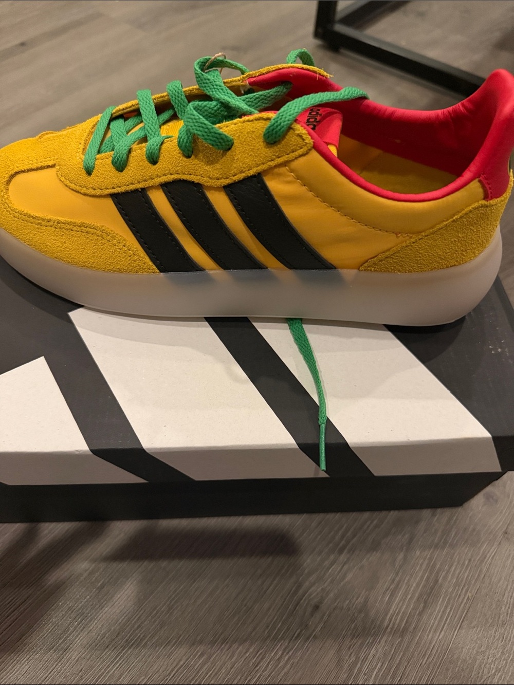 adidas Yellow Trainer with Black Stripes and Green Laces